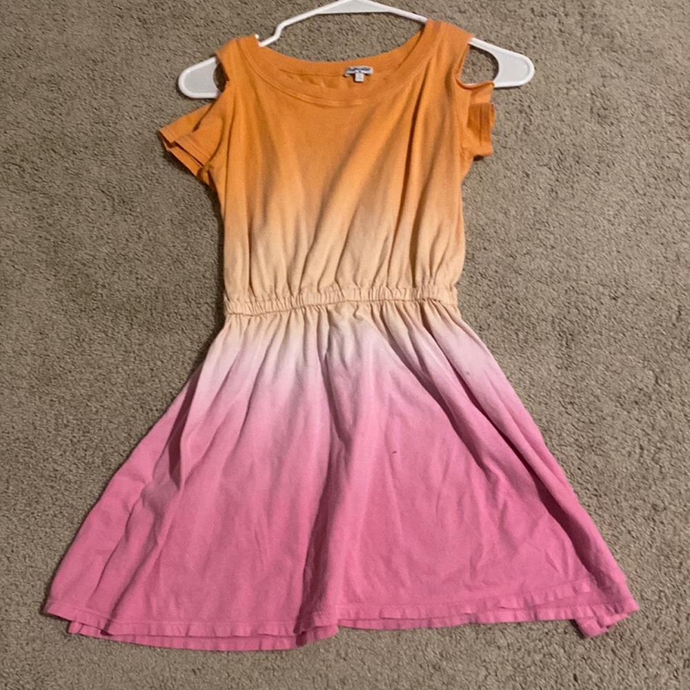 It is a pink and orange dress from splendid.